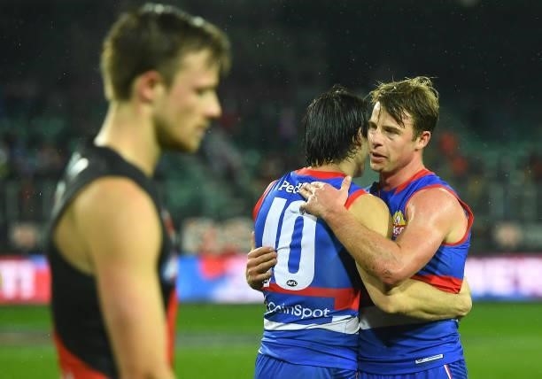 Easton Wood and Mitch Hannan of the Bulldogs celebrate winning the AFL First Elimination Final match between Western Bulldogs and Essendon Bombers at...