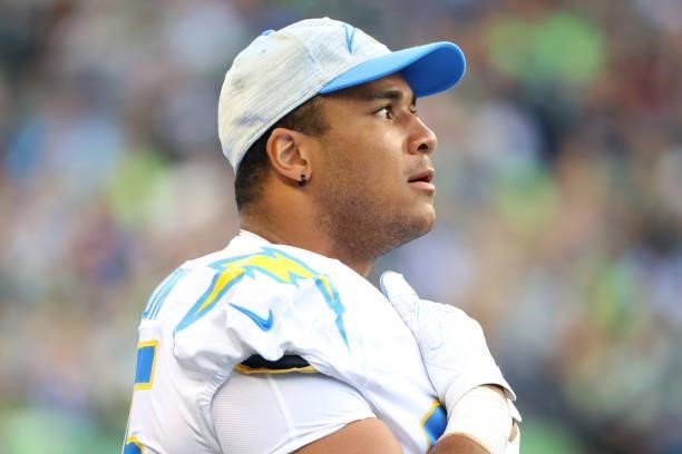Christian Covington of the Los Angeles Chargers looks on in the first quarter during the NFL preseason game against the Seattle Seahawks at Lumen...
