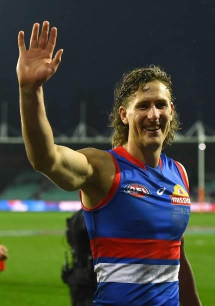 Aaron Naughton and his Bulldogs team mates celebrate winning the AFL First Elimination Final match between Western Bulldogs and Essendon Bombers at...