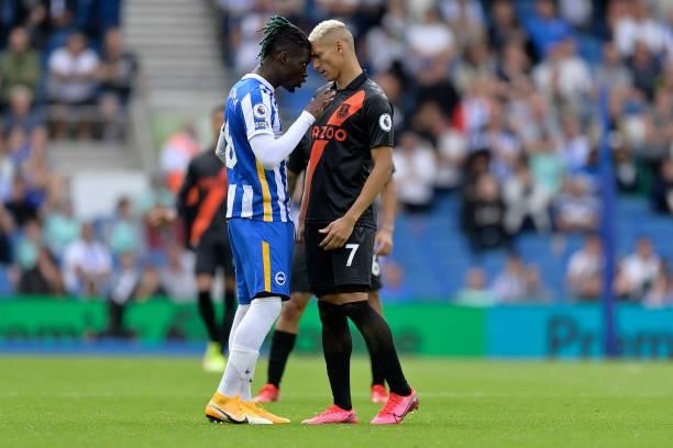 Richarlison of Everton and Yves Bissouma go head to head during the Premier League match between Brighton & Hove Albion and Everton at American...
