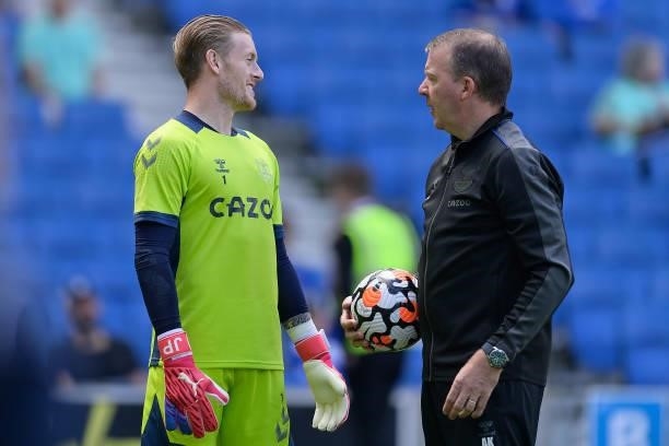 Jordan Pickford speaks to Everton Goalkeeper Coach Alan Kelly before the Premier League match between Brighton & Hove Albion and Everton at American...