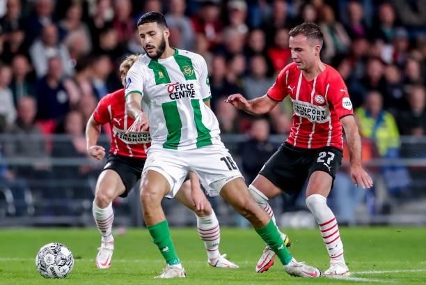 Ahmed El Messaoudi of FC Groningen, Mario Gotze of PSV during the Dutch Eredivisie match between PSV and FC Groningen at Philips Stadion on August...