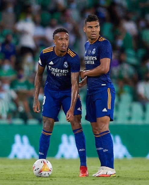 Eder Militao and Casemiro of Real Madrid looks on during the La Liga Santader match between Real Betis and Real Madrid CF at Estadio Benito...