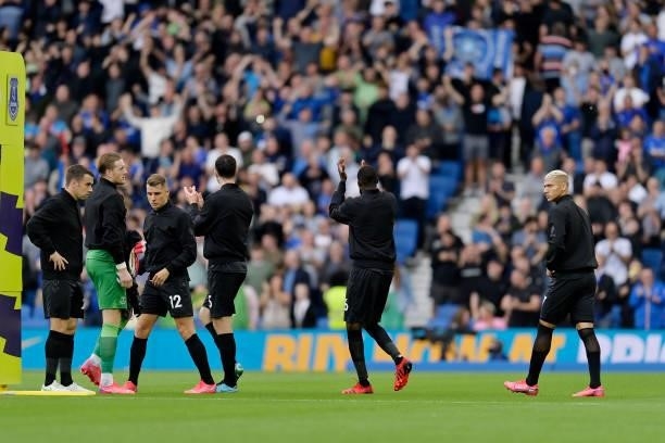 Seamus Coleman Jordan Pickford Lucas Digne Michael Keane Abdoulaye Doucoure Richarlison of Everton in front of. The travelling fans before the...