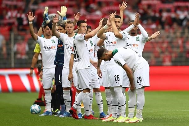 Players of Borussia Mönchengladbach interact with the crowd ahead of the Bundesliga match between 1. FC Union Berlin and Borussia Mönchengladbach at...