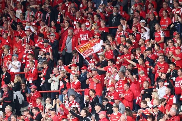 Fans of 1. FC Union Berlin look on during the Bundesliga match between 1. FC Union Berlin and Borussia Mönchengladbach at Stadion An der Alten...