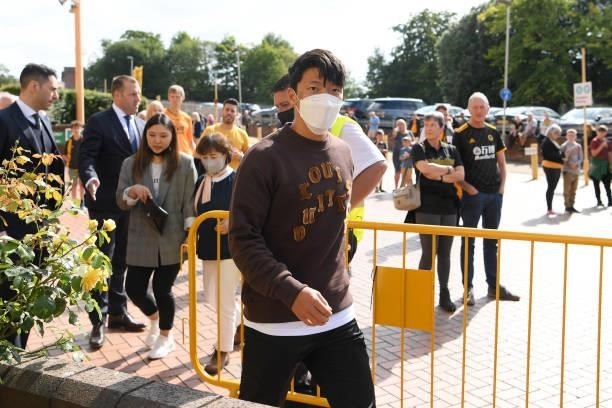 Hwang Hee-Chan of Wolverhampton Wanderers arrives ahead of the Premier League match between Wolverhampton Wanderers and Manchester United at Molineux...