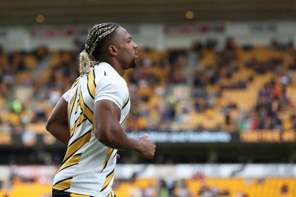 Adama Traore of Wolverhampton Wanderers warms up ahead of the Premier League match between Wolverhampton Wanderers and Manchester United at Molineux...