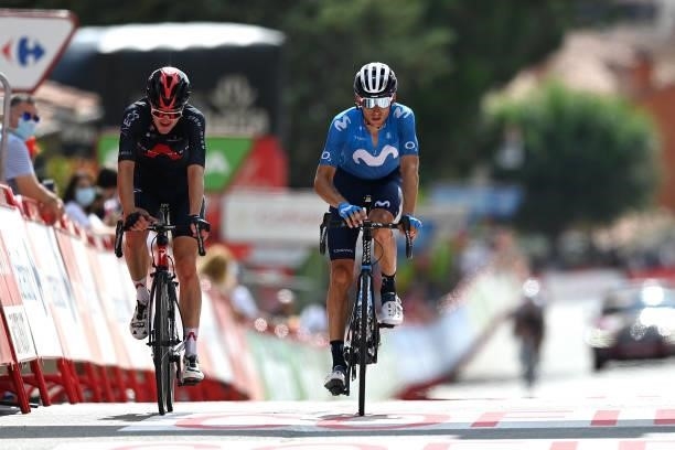 Pavel Sivakov of Russia and Team INEOS Grenadiers and Carlos Verona Quintanilla of Spain and Movistar Team cross the finishing line during the 76th...