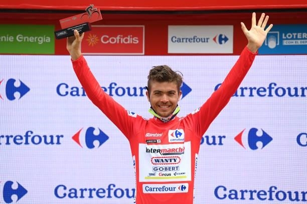 Odd Christian Eiking of Norway and Team Intermarché - Wanty - Gobert Matériaux celebrates winning the red leader jersey on the podium ceremony after...
