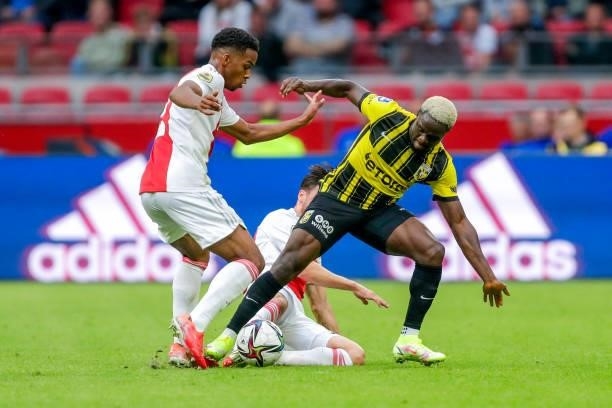 Jurrien Timber of Ajax, Hillary Gong of Vitesse during the Dutch Eredivisie match between Ajax and Vitesse at Johan Cruijff ArenA on August 29, 2021...