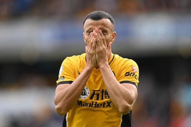 Romain Saiss of Wolverhampton Wanderers reacts after a missed chance during the Premier League match between Wolverhampton Wanderers and Manchester...