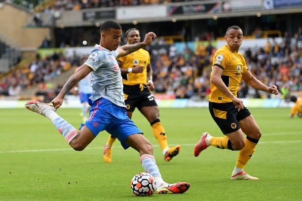 Mason Greenwood of Manchester United scores their sides first goal during the Premier League match between Wolverhampton Wanderers and Manchester...