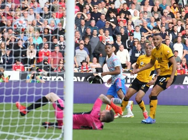 Mason Greenwood of Manchester United scores their first goal during the Premier League match between Wolverhampton Wanderers and Manchester United at...