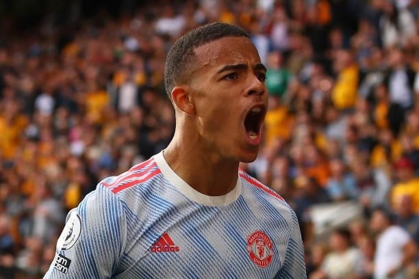 Mason Greenwood of Manchester United celebrates scoring the opening goal during the Premier League match between Wolverhampton Wanderers and...