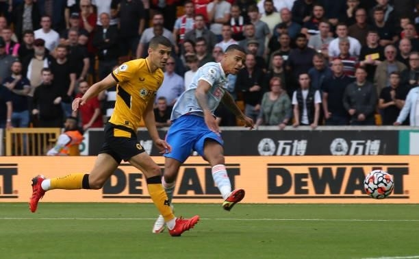 Mason Greenwood of Manchester United has a shot on goal during the Premier League match between Wolverhampton Wanderers and Manchester United at...