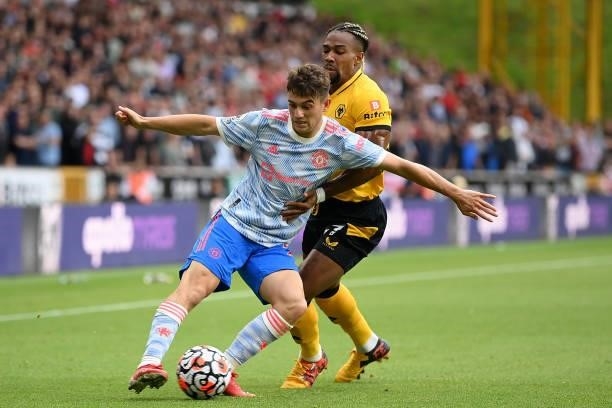 Daniel James of Manchester United battles for possession with Adama Traore of Wolverhampton Wanderers during the Premier League match between...