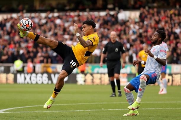Morgan Gibbs-White of Wolverhampton Wanderers has a shot on goal during the Premier League match between Wolverhampton Wanderers and Manchester...