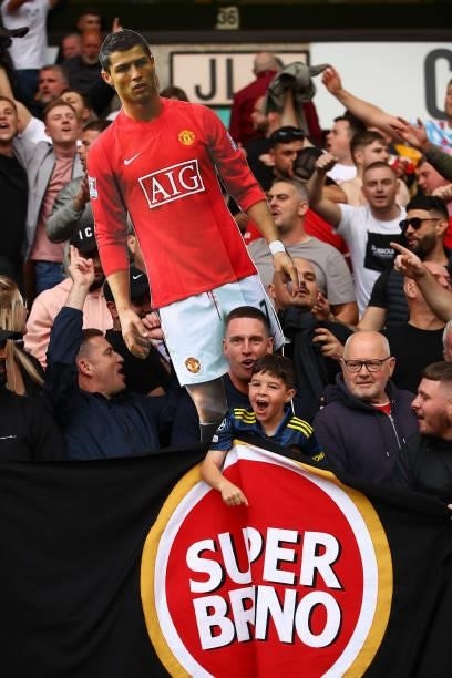 Manchester United fans hold up a life size cut out of Cristiano Ronaldo during the Premier League match between Wolverhampton Wanderers and...