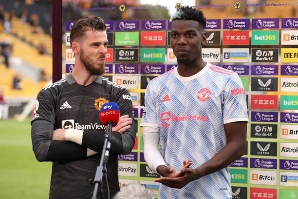 Paul Pogba of Manchester United is interviewed alongside team mate David De Gea following the Premier League match between Wolverhampton Wanderers...