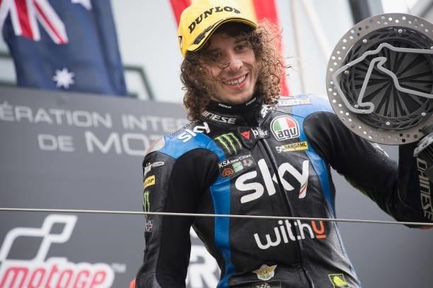 Marco Bezzecchi of Italy and Sky Racing Team VR46 celebrates the third place on the podium during the Moto2 race during the MotoGP of Great Britain -...