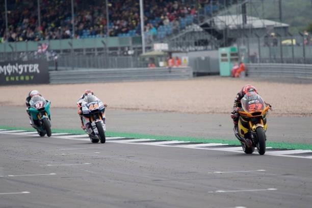 Augusto Fernandez of Spain and Elf Marc VDS Racing Team leads the field during the Moto2 race during the MotoGP of Great Britain - Race at...