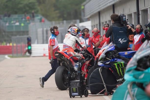 Jorge Martin of Spain and Pramac Racing returns in box after crashed out during the MotoGP race during the MotoGP of Great Britain - Race at...