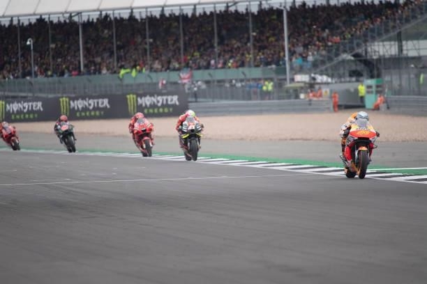 Pol Espargaro of Spain and Repsol Honda Team leads the field during the MotoGP race during the MotoGP of Great Britain - Race at Silverstone Circuit...