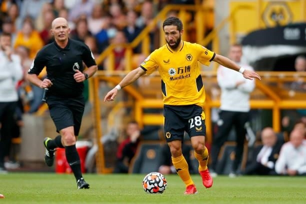 Joao Moutinho of Wolverhampton Wanderers runs with the ball during the Premier League match between Wolverhampton Wanderers and Manchester United at...