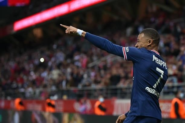 Kylian Mbappe of Paris Saint-Germain reacts after scoring during the Ligue 1 Uber Eats match between Reims and Paris Saint Germain at Stade Auguste...