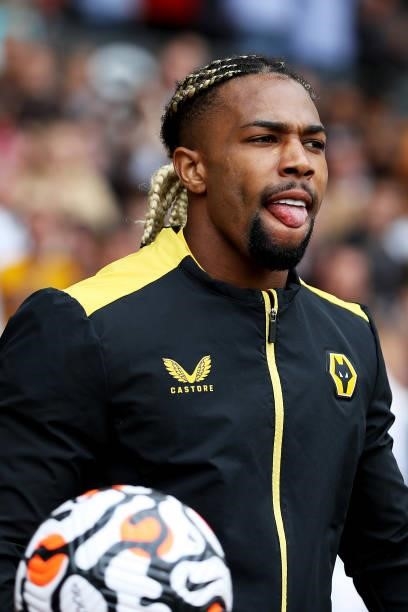 Adama Traore of Wolverhampton Wanderers walks out to the pitch ahead of the Premier League match between Wolverhampton Wanderers and Manchester...