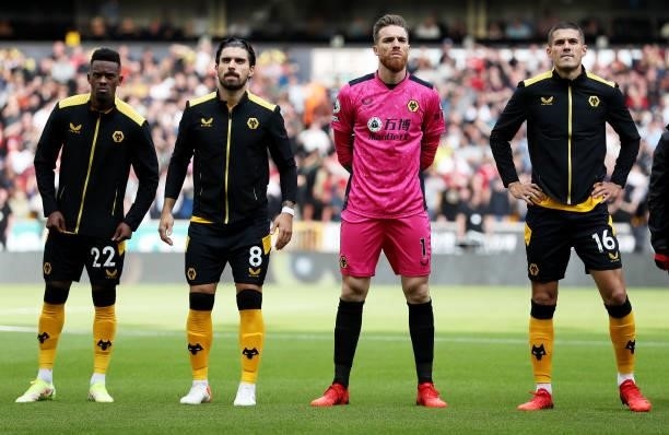 Nelson Semedo, Ruben Neves, Jose Sa and Conor Coady of Wolverhampton Wanderers line up ahead of the Premier League match between Wolverhampton...