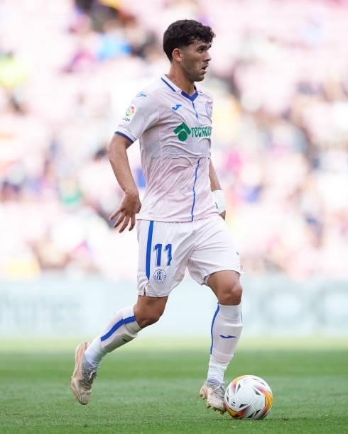 Carles Alena of Getafe CF runs with the ball during the La Liga Santander match between FC Barcelona and Getafe CF at Camp Nou on August 29, 2021 in...