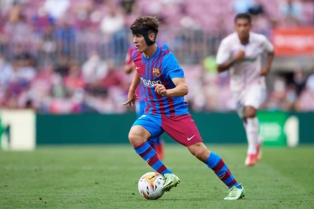 Pablo Paez 'Gavi' of FC Barcelona runs with the ball during the La Liga Santander match between FC Barcelona and Getafe CF at Camp Nou on August 29,...