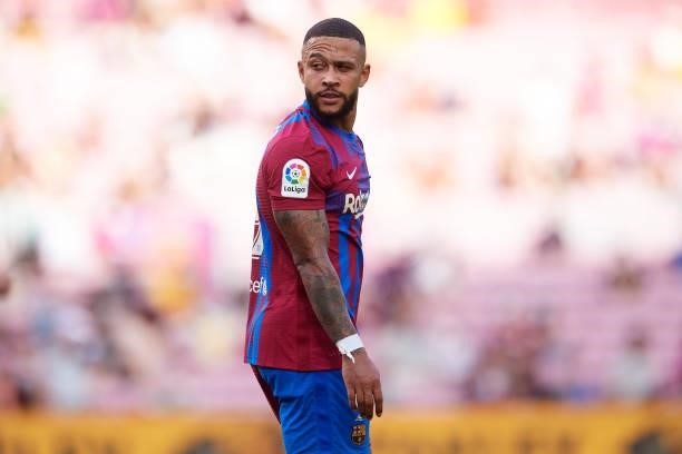 Memphis Depay of FC Barcelona looks on during the La Liga Santander match between FC Barcelona and Getafe CF at Camp Nou on August 29, 2021 in...