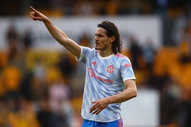 Edinson Cavani of Manchester United celebrates at full-time following the Premier League match between Wolverhampton Wanderers and Manchester United...