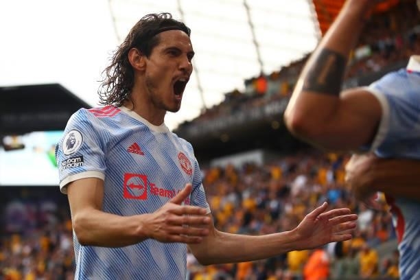 Edinson Cavani of Manchester United celebrates the opening goal during the Premier League match between Wolverhampton Wanderers and Manchester United...