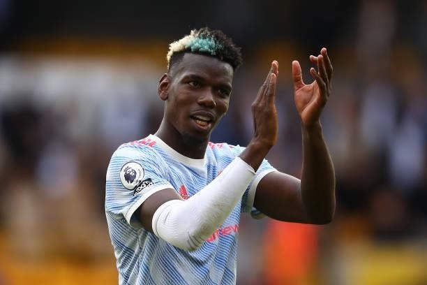 Paul Pogba of Manchester United applauds the supporters following the Premier League match between Wolverhampton Wanderers and Manchester United at...