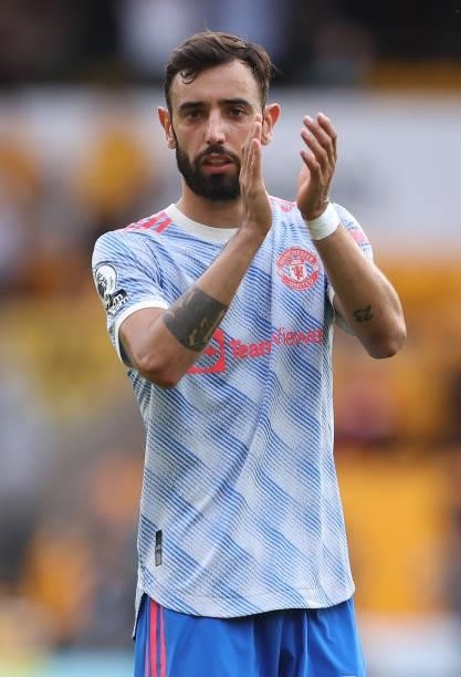 Bruno Fernandes of Manchester United applauds their support after the Premier League match between Wolverhampton Wanderers and Manchester United at...