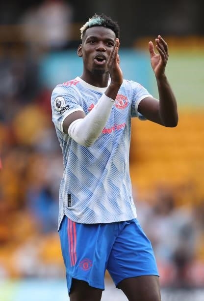 Paul Pogba of Manchester United applauds their support after the Premier League match between Wolverhampton Wanderers and Manchester United at...