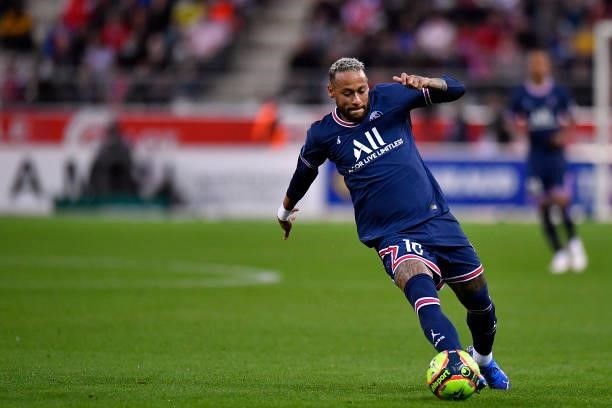 Neymar Jr of Paris Saint-Germain runs with the ball during the Ligue 1 Uber Eats match between Reims and Paris Saint Germain at Stade Auguste Delaune...