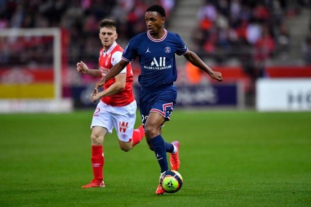 Abdou Diallo of Paris Saint-Germain fights for possession during the Ligue 1 Uber Eats match between Reims and Paris Saint Germain at Stade Auguste...