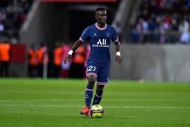 Idrissa Gueye of Paris Saint-Germain runs with the ball during the Ligue 1 Uber Eats match between Reims and Paris Saint Germain at Stade Auguste...