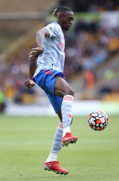 Aaron Wan-Bissaka of Manchester United controls the ball during the Premier League match between Wolverhampton Wanderers and Manchester United at...