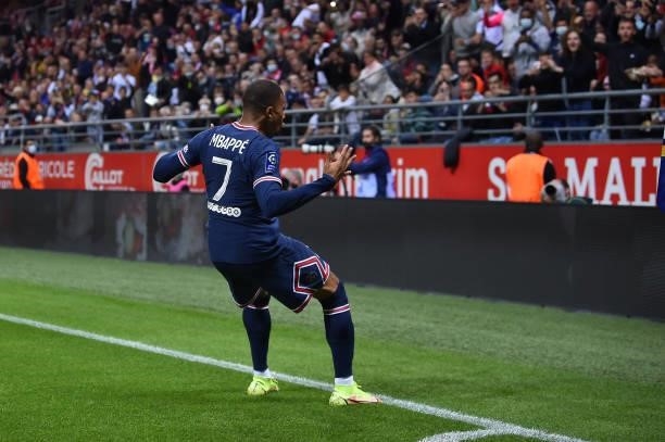 Kylian Mbappe of Paris Saint-Germain reacts after scoring during the Ligue 1 Uber Eats match between Reims and Paris Saint Germain at Stade Auguste...