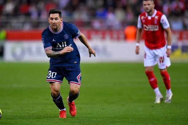 Lionel Messi of Paris Saint-Germain runs for the ball during the Ligue 1 Uber Eats match between Reims and Paris Saint Germain at Stade Auguste...