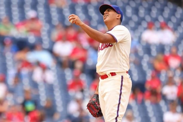 Pitcher Ranger Suarez of the Philadelphia Phillies reacts as manager Joe Girardi comes out to make a pitching change in the sixth inning against the...