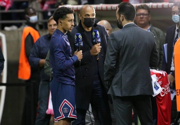 Thierry Henry, pundit for Amazon Prime VIdeo interviews Marquinhos of PSG following the Ligue 1 Uber Eats match between Stade Reims and Paris Saint...