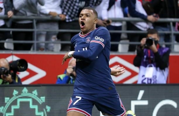 Kylian Mbappe of PSG celebrates his second goal during the Ligue 1 Uber Eats match between Stade Reims and Paris Saint Germain at Stade Auguste...