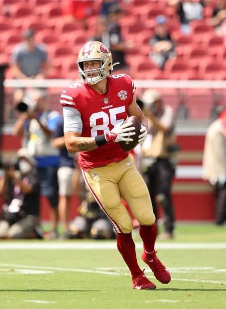George Kittle of the San Francisco 49ers warms up before their preseason game against the Las Vegas Raiders at Levi's Stadium on August 29, 2021 in...